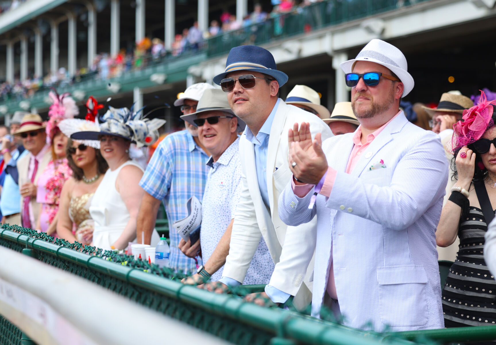 Fans cheer at Churchill Downs at race.JPG